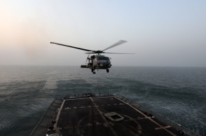 An SH-60B Seahawk assigned to the "Scorpions" of Light Helicopter Anti-Submarine Squadron (HSL) 49 lifts off from the Oliver Hazard Perry-class frigate USS Thach (FFG 43). The SH-60B conducts anti-submarine and anti-surface warfare missions from the decks of cruisers, destroyers and frigates. Thach and the Ronald Reagan Carrier Strike Group (CCSG) 7 are currently on a routine deployment in the U.S. 5th Fleet area of responsibility. Operations to the U.S. 5th Fleet are focused on reassuring regional partners of the United States' commitment to security, which promotes stability and global prosperity. (U.S. Navy photo by Mass Communication Specialist 2nd Class Joseph M. Buliavac/Released)