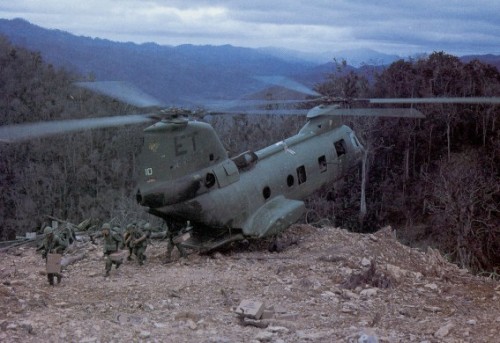 One of HMM-262s "ET" CH-46s landing in a RAMP HOVER at LZ Catapult after two 46s were disabled=