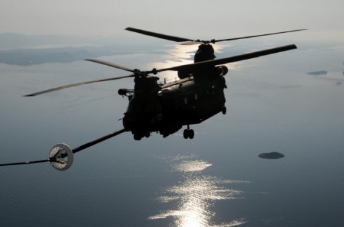 A U.S Army MH-47 Chinook assigned to to the 160th Special Operations Aviation Regiment (Airborne), Fort Campbell, Ky., is refueled by a MC-130P Shadow airplane assigned to the 67th Special Operations Squadron, 352nd Special Operations Group based at RAF Mildenhall, England, as part of a helicopter aerial refueling mission over the Adriatic Sea as part of the Jackal Stone 2009 exercise being held in Croatia. (Photo by MSG Donald Sparks)