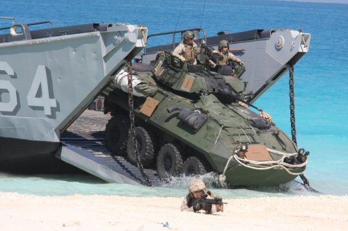 A light-armored vehicle from Weapons Company, Battalion Landing Team, 3rd Battalion, 2nd Marine Regiment, 22nd Marine Expeditionary Unit (MEU), assaults the beach from a landing craft utility from Assault Craft Unit (ACU) 2 during an amphibious assault demonstration conducted as part of Bright Star 2009 in Egypt Oct. 12, 2009. The multinational exercise is designed to improve readiness, interoperability, strengthen the military and professional relationships among U.S., Egyptian and participating forces. Bright Star is conducted by U.S. Central Command and held every two years. Elements of the 22nd MEU are currently are participating in the multi-national exercise while serving as the theater reserve force for U.S. Central Command. (Official Marine Corps photo by Staff Sgt. Matt Epright) 