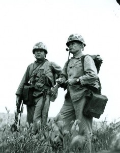 Colonel Lewis B. Puller, USMC. Studies the terrain before advancing to another enemy objective, during operations beyond Inchon, Korea, circa September 1950. He was in command of the Marine Regimental Combat Team One of the First Marine Division. Courtesy of the U.S. Naval Institute, Annapolis, Maryland, NHHC Photograph Collection, NH 93034.